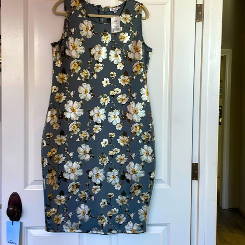 Dark grey/silver elegant 3/4 length dress with opalescent flowers.